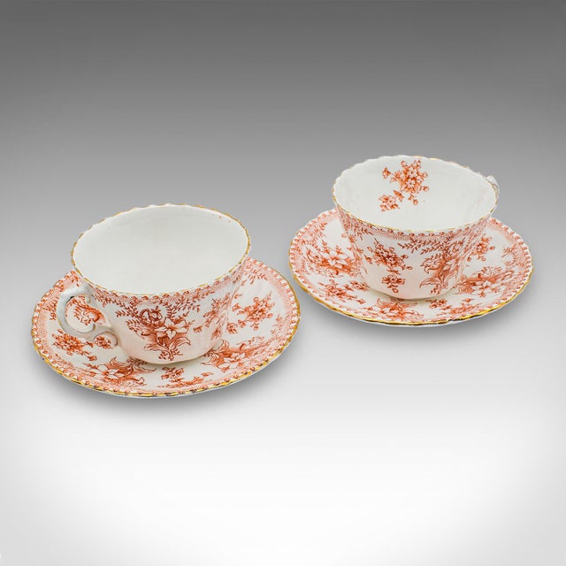 This is an antique two-person afternoon tea set. An English, bone China cup and saucer, sandwich and cake plate duo,...