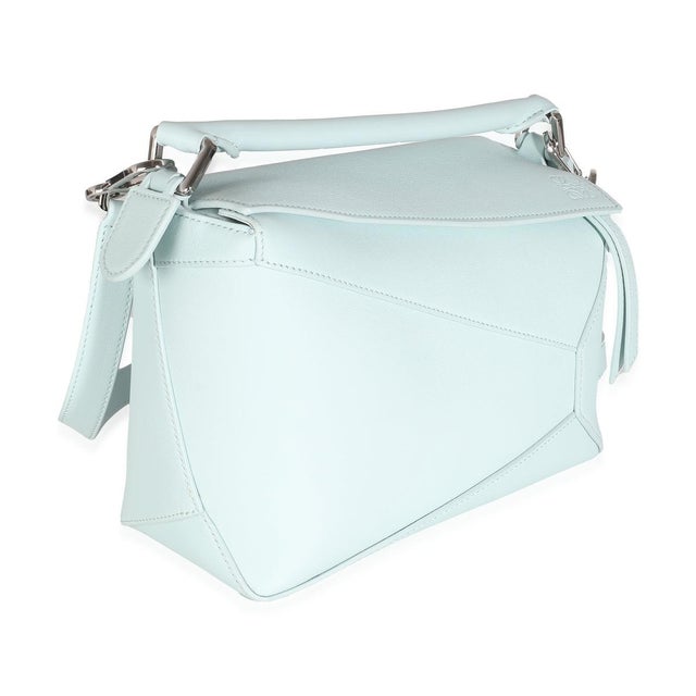 Item #: 143174 Interior Material: Fabric MSRP: 3,250 Features Interior: One slip pocket Dimensions: 9.4 x 6.5 x 4.1 in...