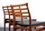 These chairs are made of solid teak and finished with a black vinyl fabric. The teak is an 8.5 or 9 out of 10. The vinyl...