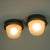 This pair of marine sconces were designed and manufactured by holophane in france in the 1950s. They feature a grey...