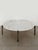 Large midcentury modern design coffe table produced by Knoll International with painted metal structure on which the round...