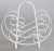 A charming French country style white painted wrought iron magazine rack with stylized scrolls and lovely patina. It's...