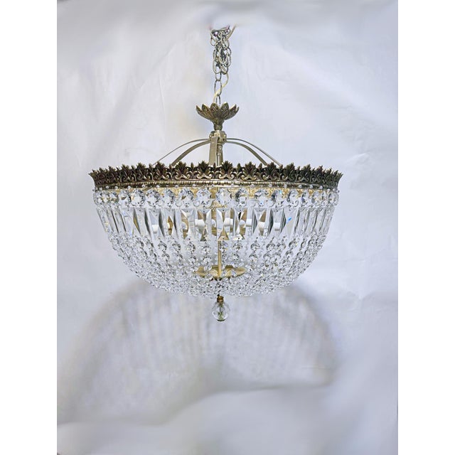 This is very decorative basket chandelier with decorative brass frame and A-chain. Rewired and restored and it has 6...