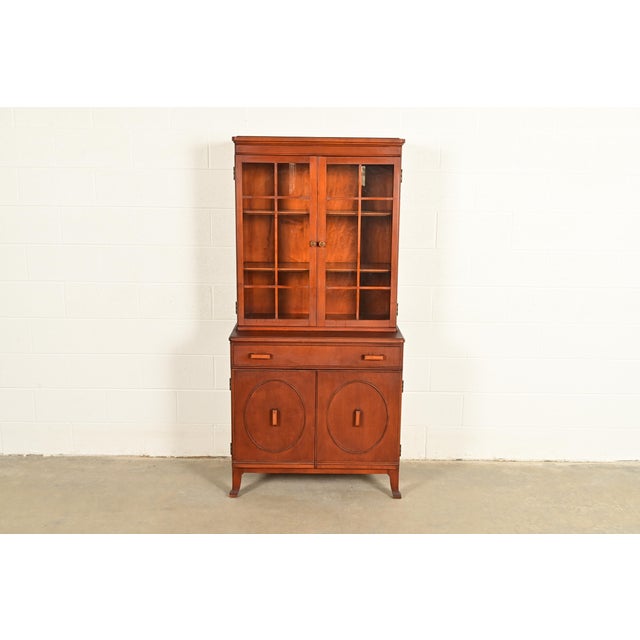 A gorgeous antique Art Deco period breakfront bookcase cabinet or dining cabinet By Stickley Brothers USA, CIrca 1920s...