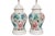 A pair of floral ceramic ginger jar table lamps, signed “Sally ‘95”. White vases are hand painted with lotus leaves and...