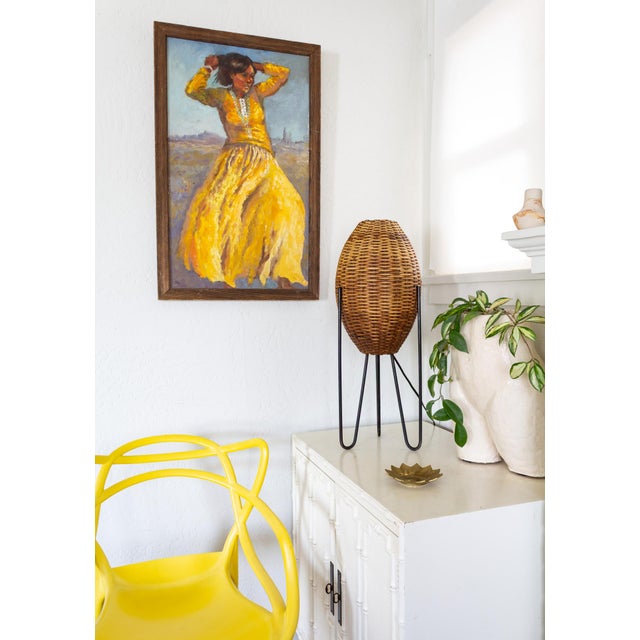 This iconic Paul Mayen rattan wicker Beehive Lamp was designed in 1965. It features three sturdy tripod hairpin legs...