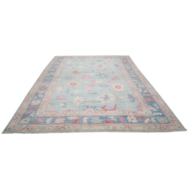 Anatolian Oushak hand knotted rug with natural colors, contemporary style and soft texture.
