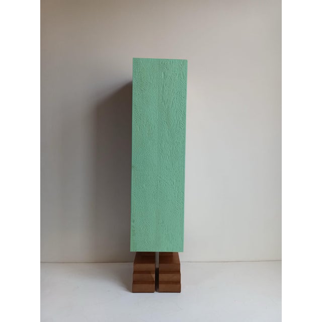 Sculpted Mayan Totem "Green" by Pietro Meccani. This sculptural piece is made entirely of larch, cherry, and maple wood...