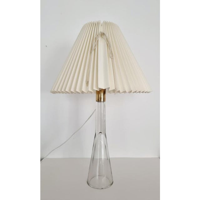 Table lamp in glass designed by Lisa Johansson-Pape for Orno oy. Glass is handmade/free blown att Iittala, Finland. Model...