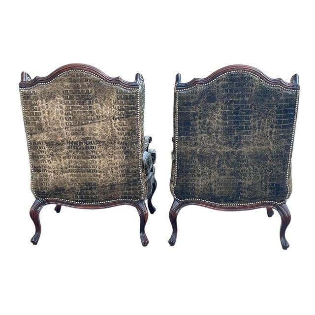 A pair of vintage club chairs by Old Hickory Tannery Nail head trim Croc embossed leather Style/design of Massoud Miles...