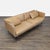 This Crate & Barrel 3-seat sofa features soft tan leather upholstery and a modern, boxy design. The sofa offers...
