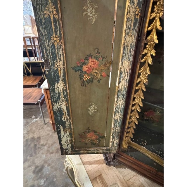 The product is a rare 19th-century Italian carved walnut table hutch, featuring intricate designs and craftsmanship...