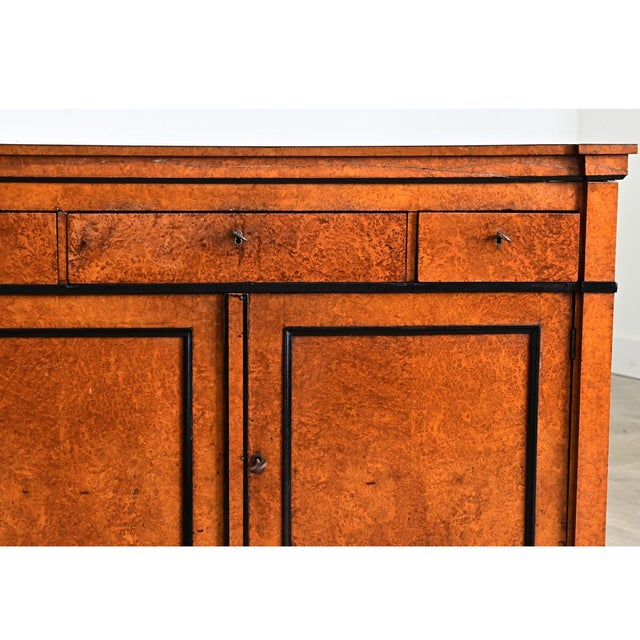 A metamorphic Dutch buffet from the 19th century, in the Biedermeier taste for graphic contrasts using beautiful thuya...