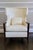 Manor Wing Back chair for Baker Furniture. These ivory leather chairs with kidney pillows bring an elevated presence to...