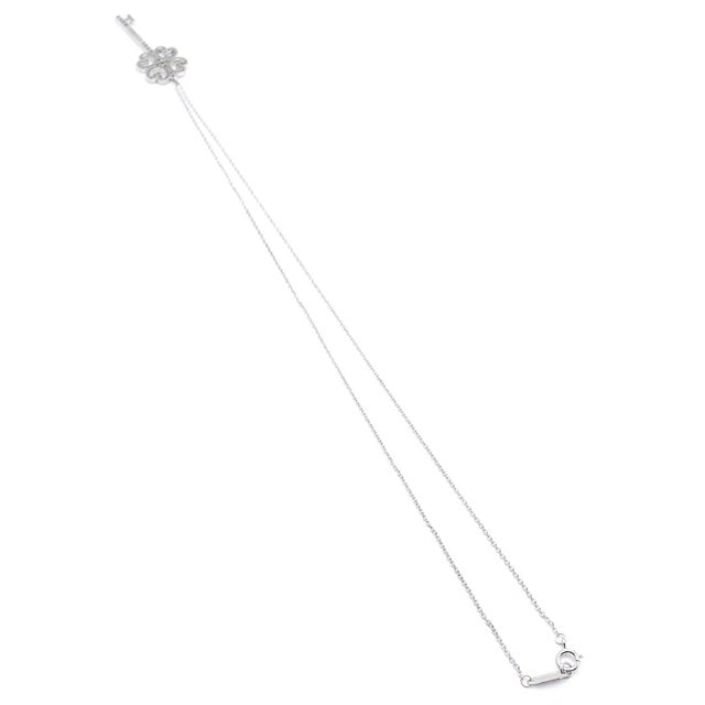 Edit Late 20th Century Tiffany & Co. Platinum & White Gold Enchant Quatra Heart Key Pendant Necklace For Sale - Image 11 of 11