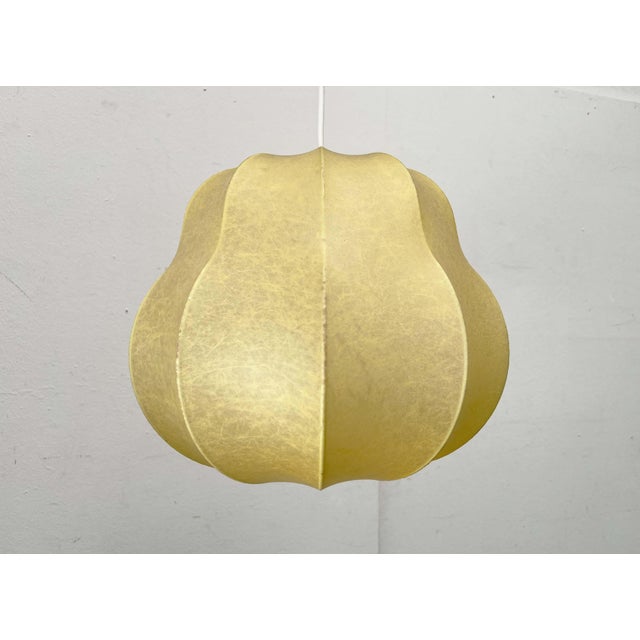 Mid-Century Modern Cocoon pendant lamp from the 1960s. This one is in a rare form. A minimalist design. The Cocoon...