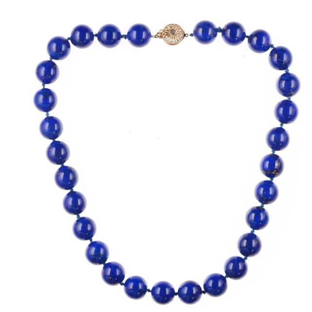 19" Vintage 14k clasp 14-15mm lapis lazuli beaded necklace. Nice quality vintage necklace with no issues. 122.2 grams....