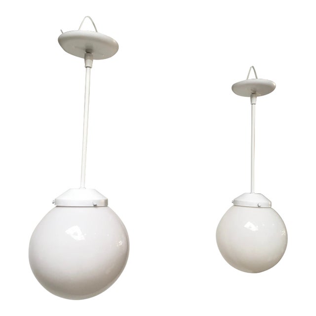 Pair of Mid-Century Modern Feldman Globe Pendant Lights, Los Angeles, Refinished White & Milk Glass For Sale