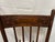 * A stunning, authentic example of 19th-century American folk craftsmanship. This primitive armless sewing rocker (or...
