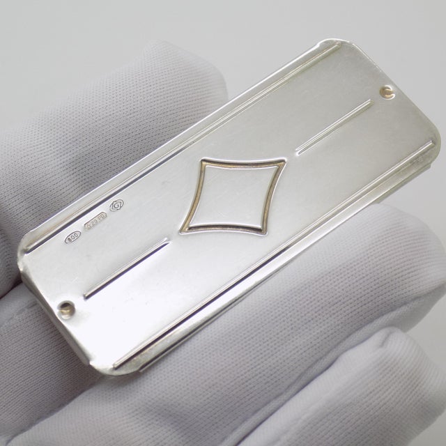 This vintage silver personal accessory depicts a slim rectangular pill box, crafted as a usable pocket container, vanity...