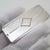 This vintage silver personal accessory depicts a slim rectangular pill box, crafted as a usable pocket container, vanity...