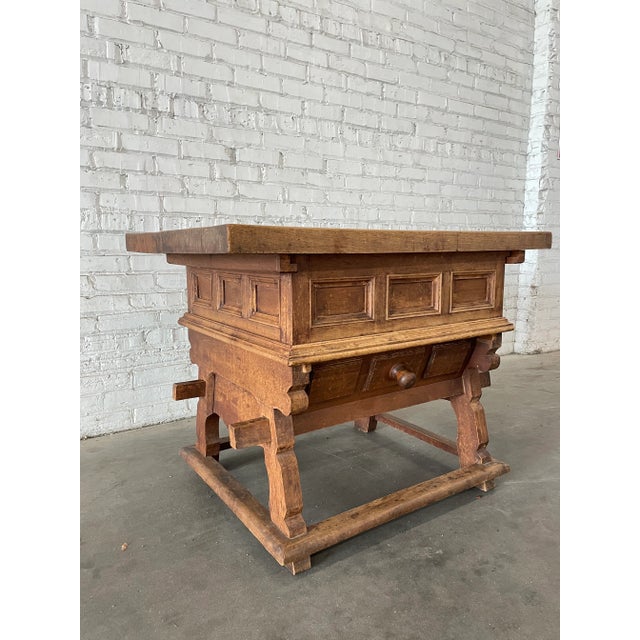 A beautiful provincial jogl table from the Alpine region of Europe. Substantial dovetailed top resting on a carved base...
