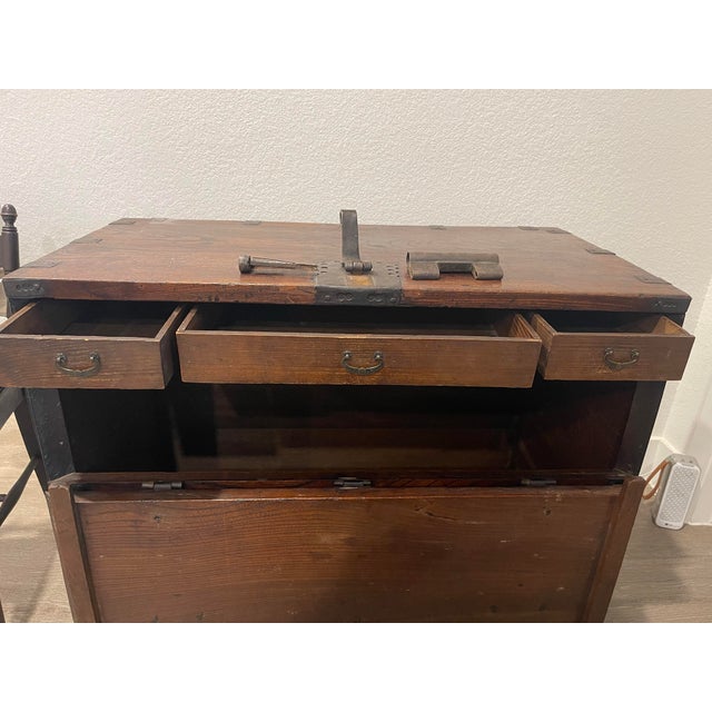 18th century Antique Korean hardwood money chest or trunk with original hand-forged iron latch plate with a pierced...