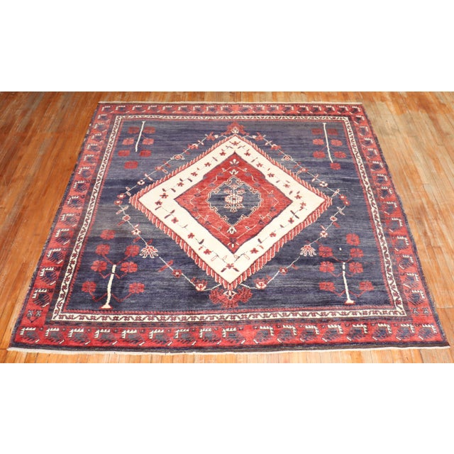 Mid 20th Century Turkish Square Size rug with tribal and rustic attributies circa mid 20th century Measures: 8'2" x 8'8"