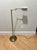 Mid Century Modern Adjustable Brass floor lamp styled after Koch and Lowy. A perfect addition to your library or beside a...