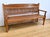 This teak veranda bench, with its classic design and decorative elements. The backrest is made up of vertical slats in...