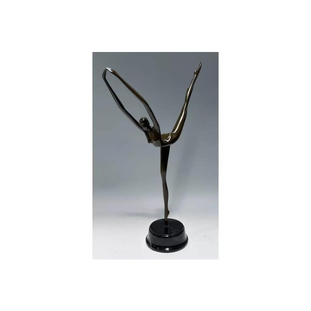 Somchai Hattakitkosol, a self-taught Thai sculptor and painter active in Bangkok and New York, produced modernist bronze...
