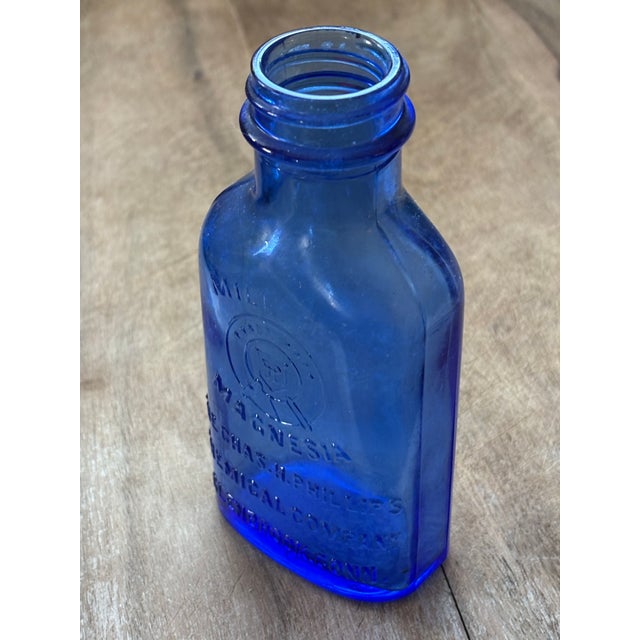 Early 1900’s Blue Glass Milk of Magnesia Bottle For Sale - Image 4 of 7