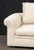 Modern Beige Fabric Upholstered Three-Seat Sofa, with three throw pillows. 28" H x 93" W x 46" D; seat: 20" H. Provenance:...