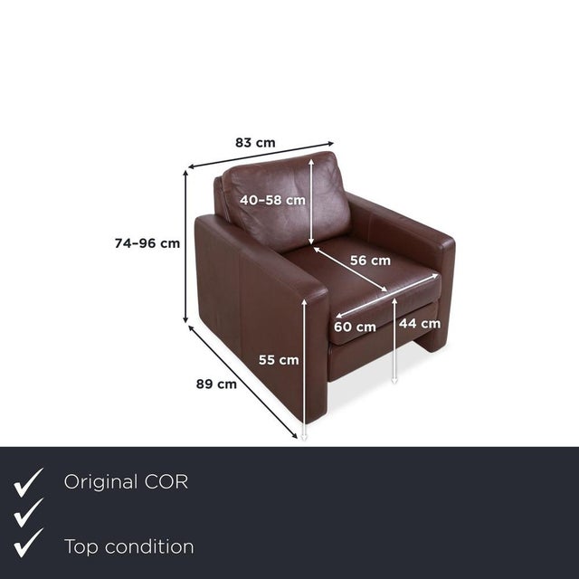 COR Conseta leather armchair in brown, including headrest. This model impresses with its timeless design, first-class...