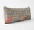 This beautiful 16'' x 48'' pillow cover was made from an authentic Turkish rug. Bright colors of wool adorn the front of...