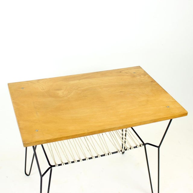 Mid-century coffee table produced in Czechoslovakia in the 1970s, originally designed as part of a garden set. The piece...