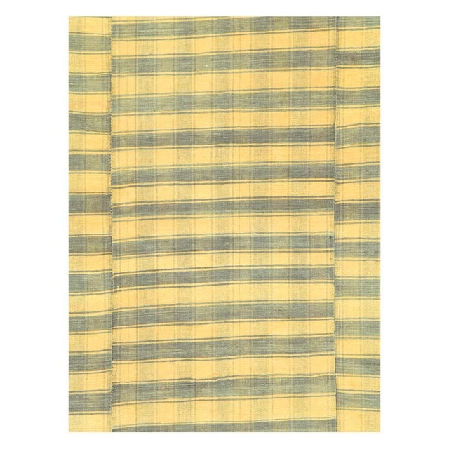 A vintage Turkish flat-weave Kilim small room size accent rug handmade during the mid-20th century with a striped pattern...