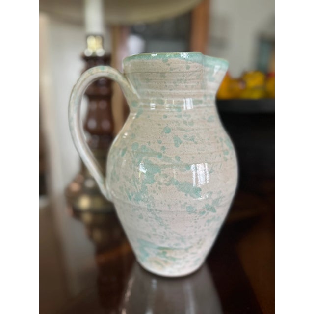 Beautiful pastel colors signed by artist. Teaque’s frogtown pottery out of Eagle Springs North Carolina.