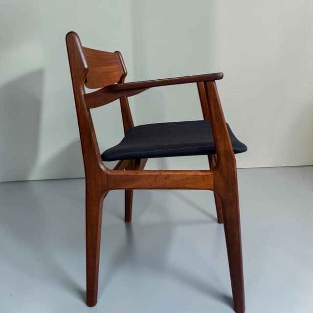 Elegant Danish armchair from the 1960s, attributed to Erik Buch and manufactured by Sorø Stolefabrik, Denmark. The chair...