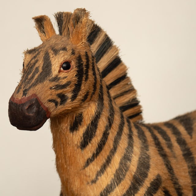 Faithful scale reproduction of a zebra. Made of synthetic material. A 1970s decorative object. Good overall condition with...