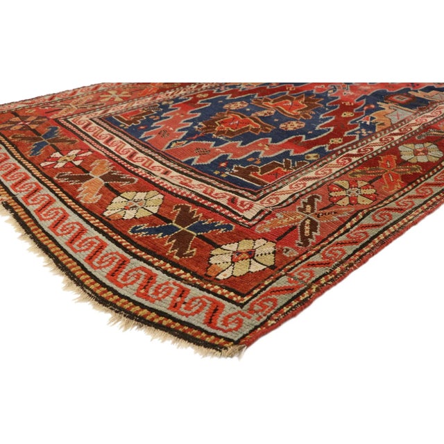73080 Antique Caucasian Kazak Rug, 04’00 x 08’00. Bold and rustic, this hand-knotted wool antique Caucasian Kazak rug...