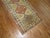 Casual mid-20th century Turkish Anatolian runner. Green yellow gold field with multiple accent colors. Measures: 2'11" x...