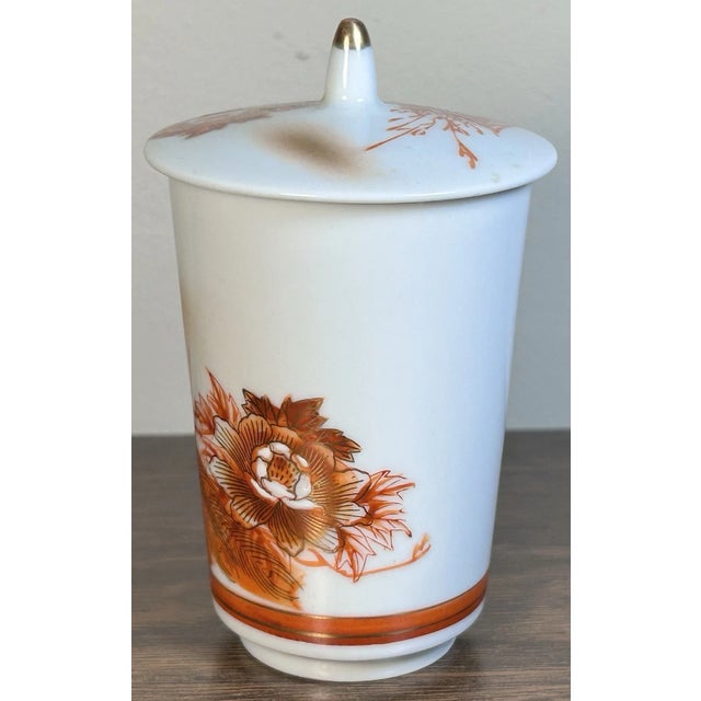 This is a Vintage 1970’s Japanese Kutani Porcelain Peacock/Floral Yunomi Lidded Teacup. It measures 4 5/8” tall to the top...