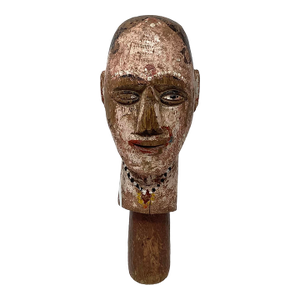 Early 20th Century Folk Art Wooden Sculpture With a Stylized Human Face.