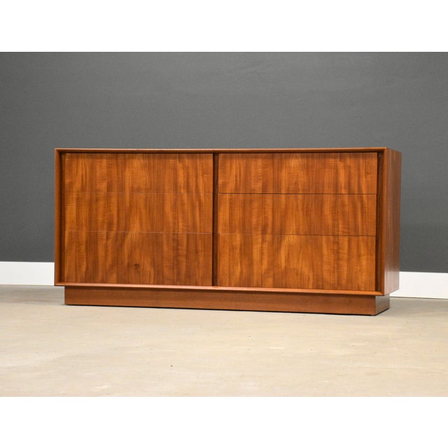A mid century modern teak six drawer dresser. Made in Denmark. Circa 1960’s. Professionally restored. 64” wide. 19” deep....