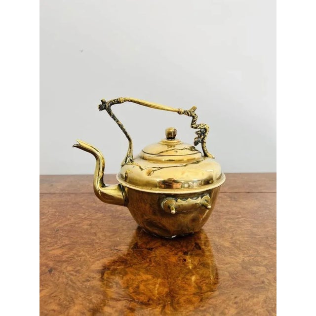 Antique Victorian quality brass spirit kettle and stand having a quality ornate brass kettle on the original ornate brass...