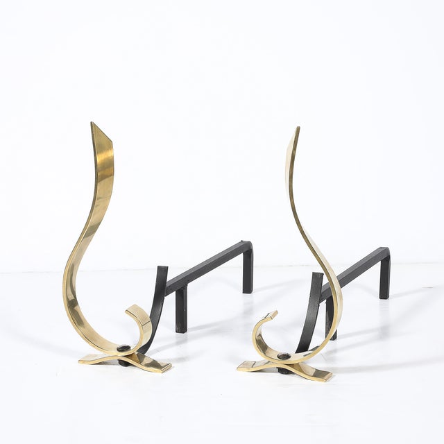 A stunning example of sleek mid-century design, this pair of curvilinear andirons exemplifies the elegance and...