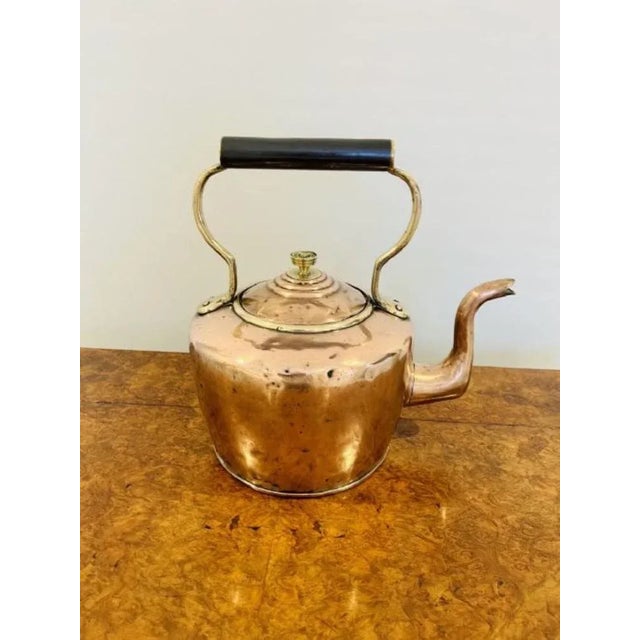 Large antique George III copper kettle having a shaped handle and spout, lift off lid with the original original ornate...