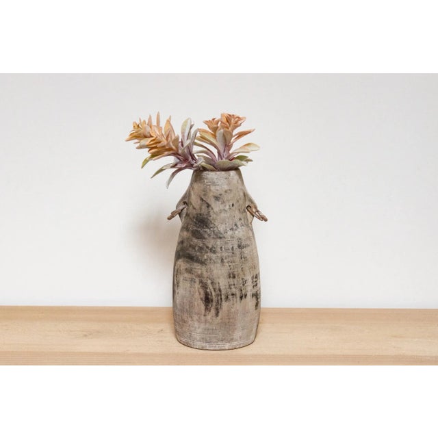 This charming antique carved wood pot was crafted from teak and originally used in Village kitchens in North India to...