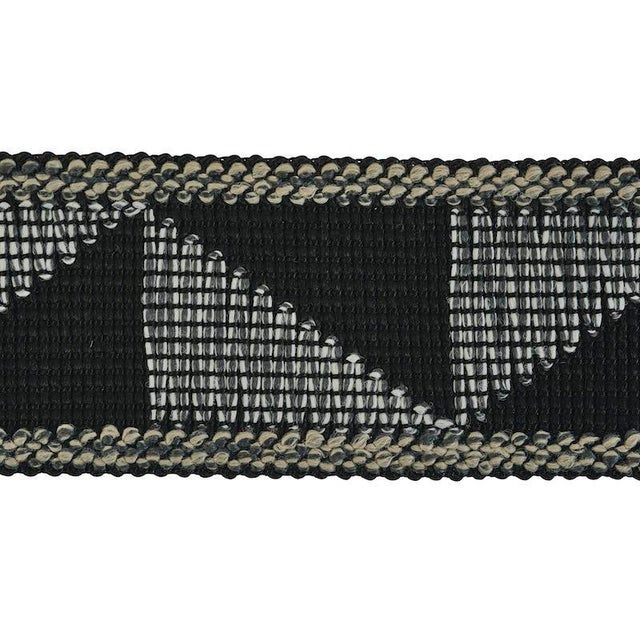 A tribal-esque geometric pattern and thick yarns give this tactile, high-performance finishing touch an artisanal,...